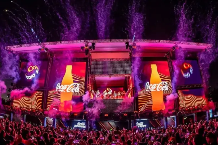 The Coca-Cola Flow Fest stage mid-show: branded LED walls, CO2 jets and a packed crowd